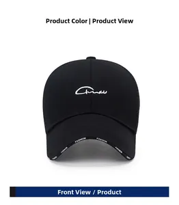 Close-up of black mesh cap with white cursive embroidery and FASHION printed brim detail