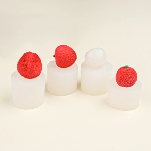 Detailed view of 4-cavity silicone mold with realistic 3D lychee fruit texture and finish