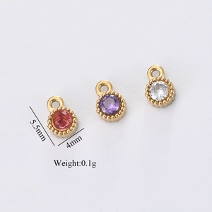 Detail view of 4mm gold-plated stainless steel charms with pink, purple and white zircons