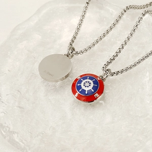 Stainless steel compass pendant necklace with nautical helm design and compass rose engraving