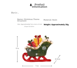 Detail of resin Christmas sleigh ornament with gift boxes and snowflake pattern