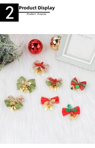 Detailed view of burlap Christmas bows with golden metal bells and festive red berries