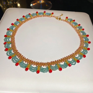 Ethnic handmade beaded choker with blue water lace and red crystals for women