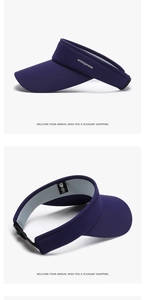 Detail of navy blue sun visor showing polyester fabric texture and adjustable buckle strap
