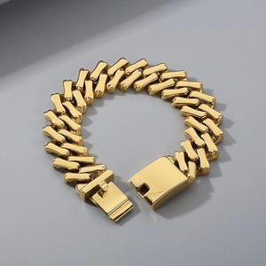 Detailed close-up of 20mm wide gold polished Cuban link chain with secure clasp