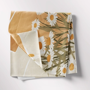 Detail of bohemian daisy floral tapestry with white flowers on mustard yellow fabric