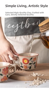 Detailed macro shot of tea being poured into a floral ceramic mug with cozy home vibes