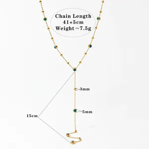 Golden Y-shaped stainless steel necklace with blue evil eye beads and gold sphere accents