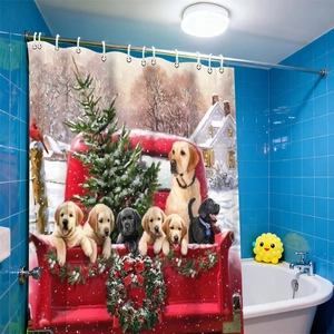 Detail of Christmas shower curtain featuring red truck, puppies, and evergreen tree