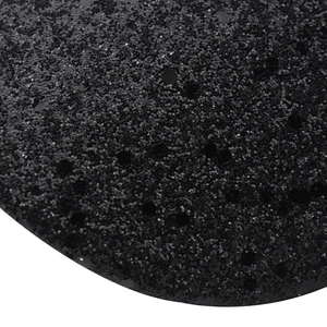 Detailed macro shot showing dense black sequins and glitter texture on the baseball cap
