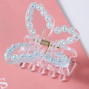 Transparent butterfly hair claw clip with colorful rhinestones and gold spring