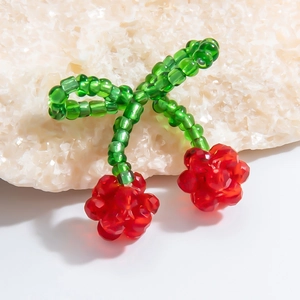 Handmade cherry crystal bead pendant with faceted red glass beads and green leaves