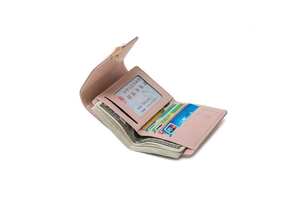 Pink PU leather tri-fold wallet detail showing multiple card slots and cash compartment
