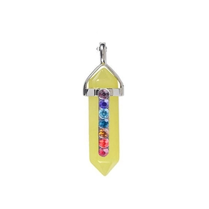 Detail of hexagonal light yellow crystal pendant with seven colorful inlaid gemstones
