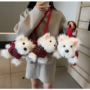 Detail of cute white plush puppy crossbody bag with red plaid vest and strap