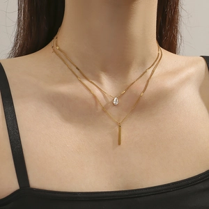 Collier double couche en acier titane doré avec pendentif goutte d'eau et barre métal