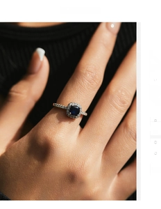 Detailed view of vintage S925 silver ring featuring a navy blue cushion-cut center stone