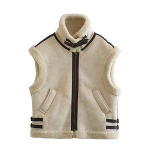 Fashionable beige faux shearling vest with brown leather trim and buckle collar details