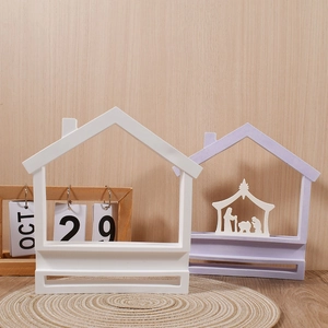 Detailed view of house shaped silicone molds for resin nativity scene decor