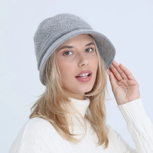 Detail view of grey knitted bucket hat with thick thermal fleece lining for women