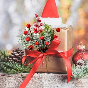 Christmas pine needle pick with red berries and snowy pinecones for holiday decor