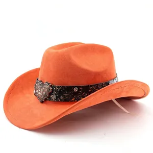 Detail of orange suede cowboy hat with paisley band and vintage heart rhinestone buckle
