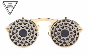 Detail of steampunk sunglasses gold metal frame featuring double gear mechanical decorations