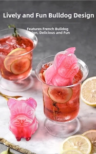 Detail of pink bulldog-shaped ice cube with realistic texture in a cool beverage glass