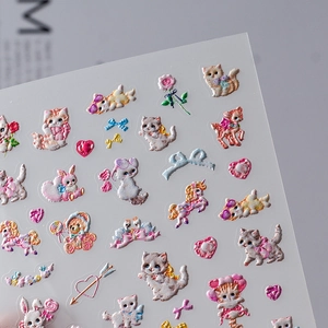 3D embossed nail art stickers featuring cute cartoon cats, rabbits and floral designs