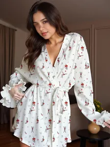 Detail of the elegant white bathrobe featuring cute rabbit prints and ruffled sleeve cuffs