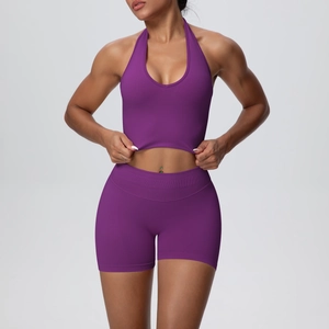 Detail view of purple ribbed sports set featuring halter neck top and high-waist shorts