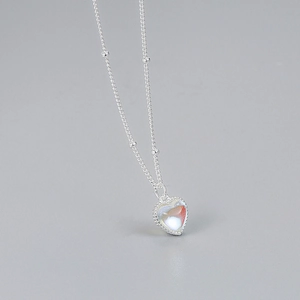 Minimalist S925 silver heart necklace featuring an iridescent moonstone on light gray background