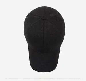 Top view detail of warm winter baseball cap with thick twill fabric and silver side accent