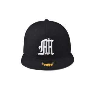 Detailed view of 3D letter embroidery on a black flat brim cotton hip hop baseball cap