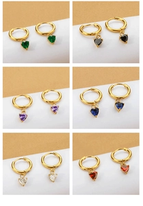 Detail showcasing six colors of heart-shaped zircon earrings in gold-tone metal finish