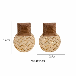 Detail showing dimensions 3.4x2.5cm and weight 4.9g of handwoven rattan stud earrings