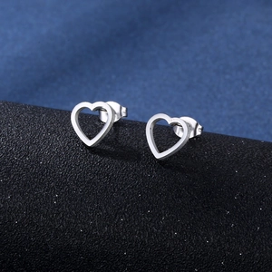 Minimalist stainless steel heart stud earrings with a brushed silver metallic finish