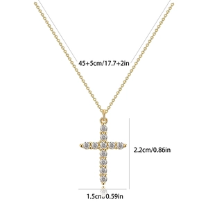 Detailed view of gold cross pendant with cubic zirconia and 45+5cm chain measurements