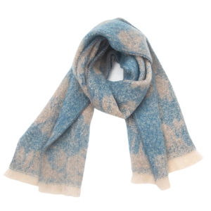 Detailed macro view of blue and beige jacquard knit wool scarf with ribbed finish