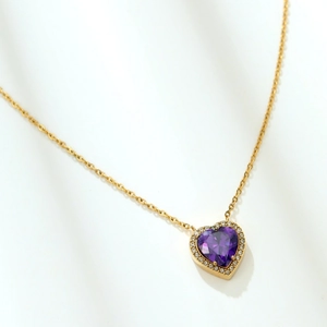 Elegant gold chain necklace with purple heart-shaped zircon gemstone and halo diamonds