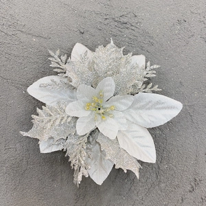 Macro detail of artificial silver flower with sparkling glitter for Christmas decoration