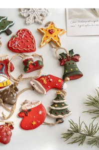 Detail of resin Christmas ornaments with frosted texture and white frosting patterns