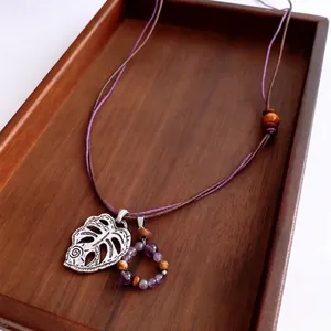 Vintage Ethnic Pendant Necklace Retro Hollow Alloy Monstera Leaf Amethyst Purple And Wood Beads Woven Cord Sweater Chain