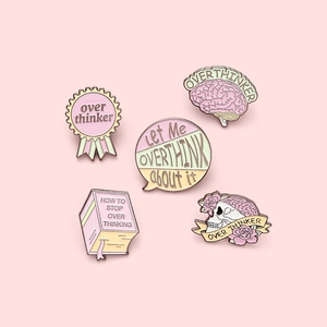 5-piece pastel enamel pin set featuring skulls and brains with Overthinker quotes