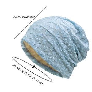 Light blue knit slouchy beanie with butterfly texture and size chart 56-60cm