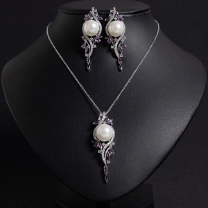 Elegant water drop pearl necklace and earrings set with purple zircon and silver finish