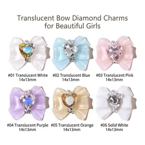 Resin bow nail art charms set with heart rhinestones and pearls in six translucent colors
