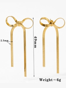 Detail view of golden bow tassel earrings with dimensions showing 49mm length and 6g weight