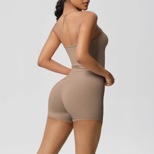 Close-up of cross-back sports bra and high-waist shorts showing athletic fit and fabric