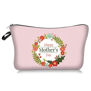 Close-up of pink Mother's Day makeup bag with floral wreath and black zipper pull